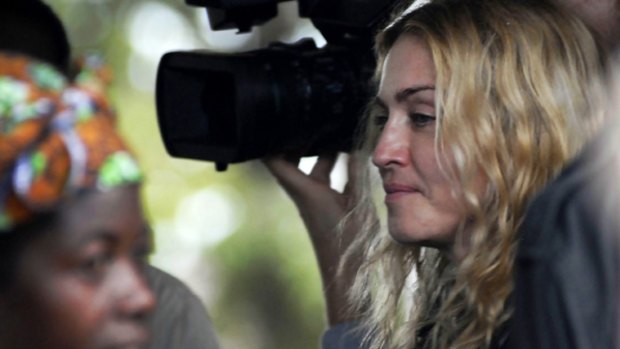 Madonna visits a development project in the Malawian village of  Gumulira on Friday. 