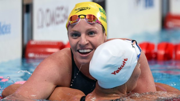Celebrations: Emily Seebohm basks in her 100m backstroke triumph.