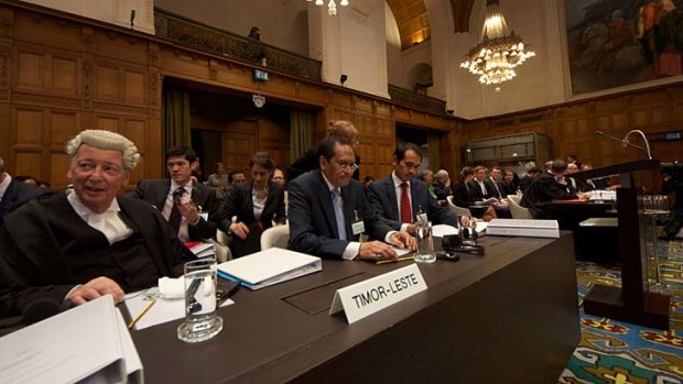 Seeking justice: East Timor's Foreign Minister, Jose Luis Gutierrez, centre, at the ICJ.