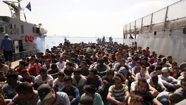Migrants are detained in Tripoli, Libya. 