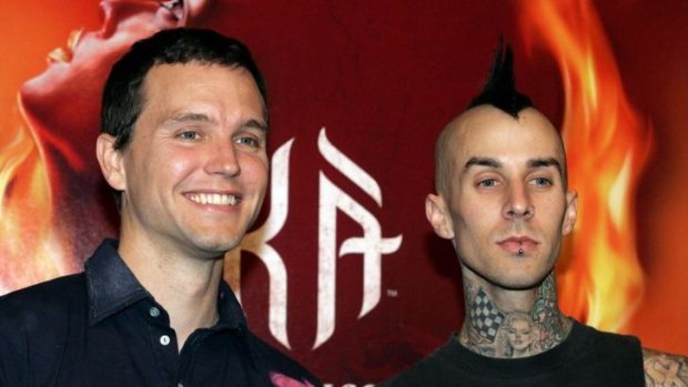 Mark Hoppus (left)  and Travis Barker issued a statement that Tom DeLonge had left Blink 182 – which he denies.