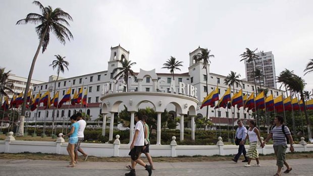 Scandal ... people walk past Hotel El Caribe. The US Secret Service sent home some of its agents for misconduct that occurred at the hotel.