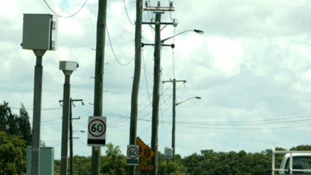 Labor claims the Government will set up more speed cameras to 'rake' in revenue.
