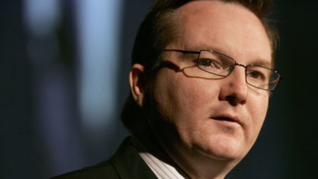 Chris Bowen ... government is taking a "wait-and-see approach" as Malayasia deal kicks off.
