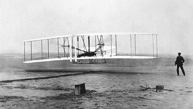 Sky high ... the Wright Flyer lifts off.