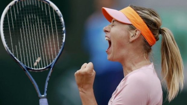 Maria Sharapova celebrates after defeating Samantha Stosur at the French Open.