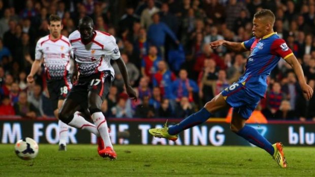 Dwight Gayle of Crystal Palace scores his team's third goal to level the scores at 3-3