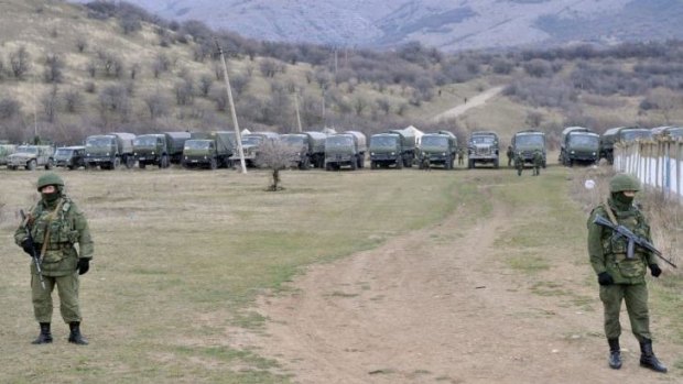Soldiers block access to a Ukrainian border guard base near Simferopol.