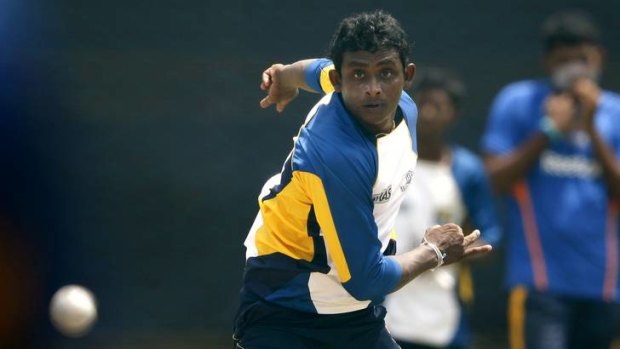 Sri Lanka's Ajantha Mendis bowls during a practice session ahead of the Super Eight match against New Zealand.