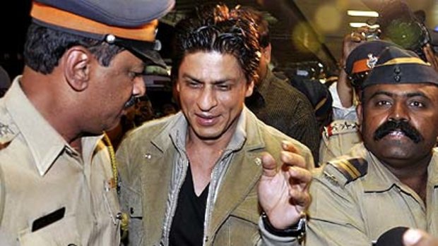Bollywood actor Shah Rukh Khan  leaves for Abu Dhabi to attend the premiere of his new movie at the international airport in Mumbai.