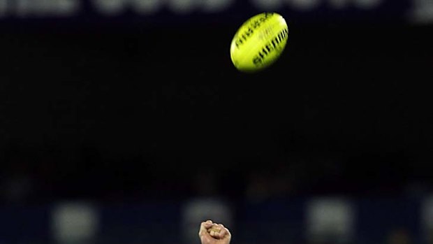 Out of reach: Kurt Tippett of the Crow and the Saints' Ben McEvoy compete for a mark.