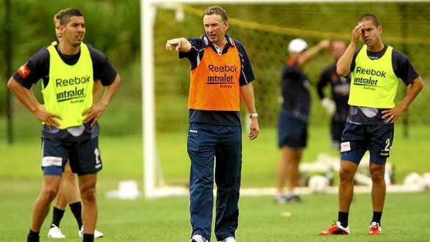 Ernie Merrick gives instructions during a Melbourne Victory A-League training session in 2011.