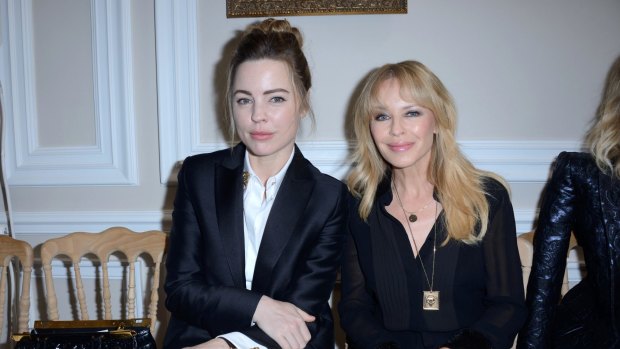 Melissa George (left) and Kylie Minogue attending the Schiaparelli show.