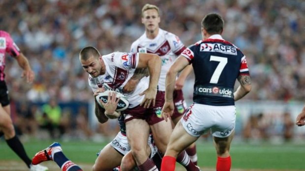 Injury worry: Manly five-eighth Kieran Foran makes a charge during last year's grand final loss to the Roosters. The star pivot is in doubt for the rematch on Friday night.