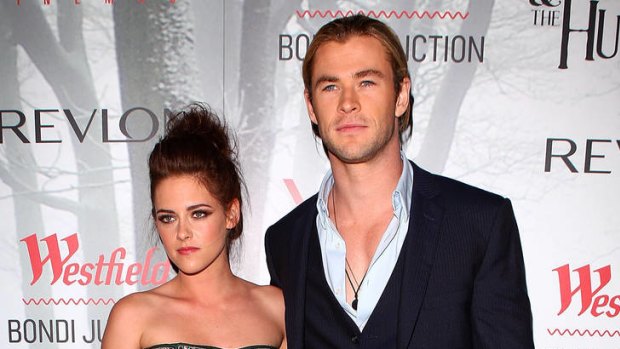 Off to work they go ...  Kristen Stewart and Chris Hemsworth arrive at the Snow White & The Huntsman premiere in Sydney.