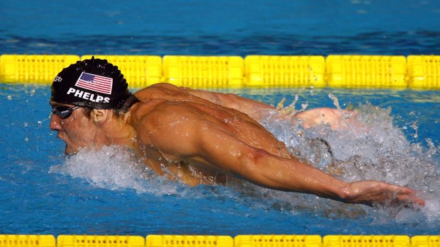Big shot: Michael Phelps, pictured competing in Australia, was surprised at the attention national swimmers receive Down Under.