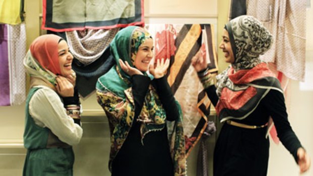 Mouna Fattouh, sister Ruby and Manaal Fatima (from left), try on the latest prints at Hajib House.