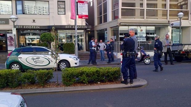 Robbery ... a man is on the run after allegedly raiding a Double Bay jewellery store.