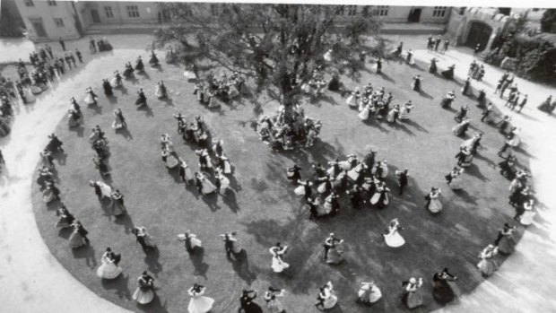 An aerial shot of the graduation waltz around the ceremonial tree in Harvard Yard in the film <i>Heaven's Gate</i>.