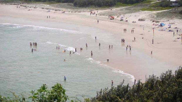 A bodyboarder has suffered life-threatening injuries after a suspected shark attack at Lighthouse Beach in Port Macquarie.