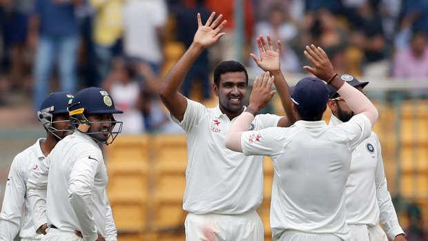 Leading wicket taker: Ravichandran Ashwincelebrates the dismissal of Australia's Mitchell Marsh.