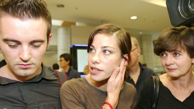Brooke Satchwell and her boyfriend David Gross arrive back in Sydney after being trapped by the Indian bombings.
