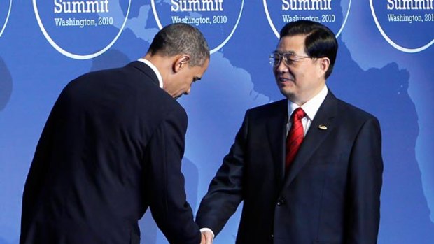 Barack Obama greets Chinese Presidnet Hu Jintao at the Nuclear Security Summit.