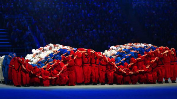 Dancers form a 'fluttering' Russian flag during the opening ceremony.
