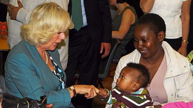 Nice to meet you ... Camilla, Duchess of Cornwall, meets local residents in Tottenham.