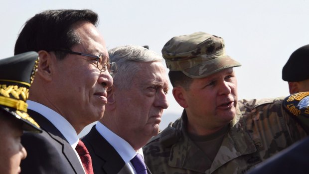 Jim Mattis, center, and South Korean Defense Minister Song Young-moo, left. Some White House officials have argued that a targeted strike could be launched with minimal blow back against South Korea – a premise Mattis views with scepticism.