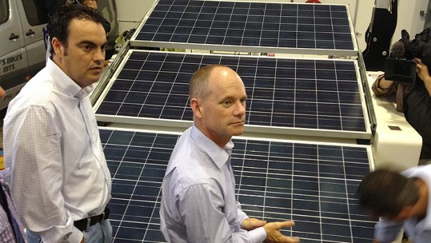 Campbell Newman inspects solar panels in Mackay during the state election campaign.