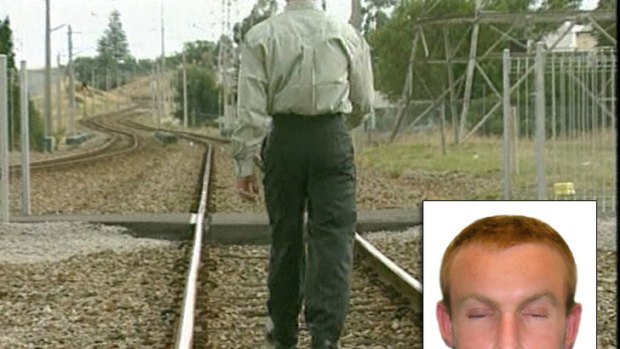Police are appealing for help to identify a man killed by a train 14 years ago.