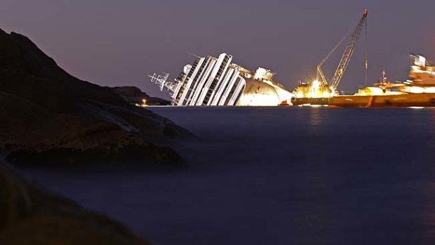 The Costa Concordia cruise ship, as it was sinking off the west coast of Italy  at Giglio Island.