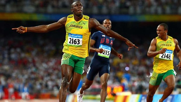 Aiming for victory ... Usain Bolt crosses the line in the mens 100m final at the 2008 Beijing Olympics.