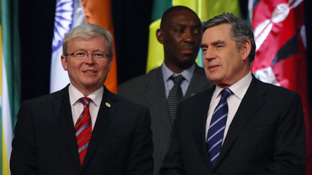 Australian Prime Minister Kevin Michael Rudd and British Prime Minister Gordon Brown attend at the opening ceremony of the Commonwealth Heads of Government Meeting.