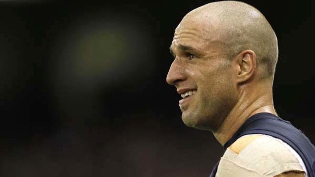 Chris Judd: showing the strain of having to do too much.