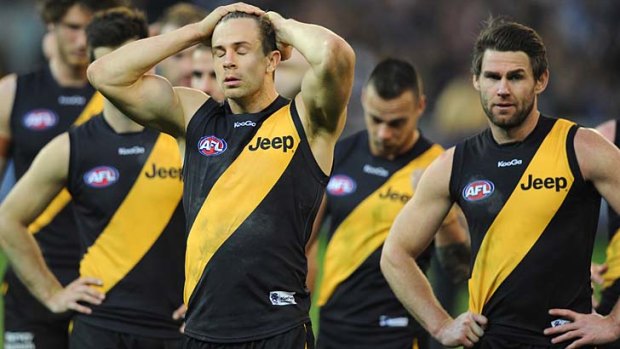 No place to hide: Richmond's Brett Deledio and Chris Newman after the elimination final loss against Carlton last September.