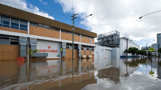 Flood water surrounds Parmalat milk factory on Montague Rd in the suburb of West End on January 13, 2011 in Brisbane, Australia.