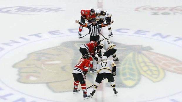 The Chicago Blackhawks face off against the Boston Bruins.