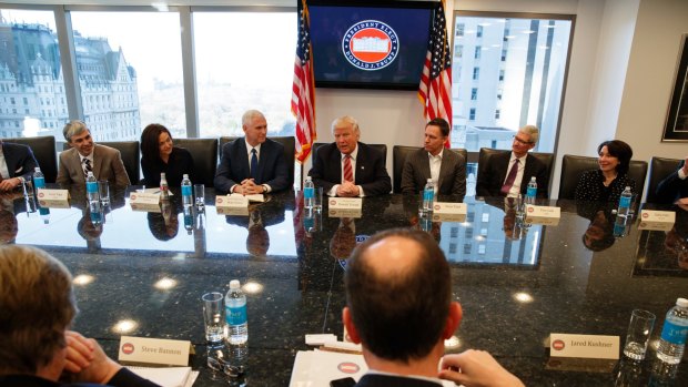 From left are, Alphabet CEO Larry Page, Facebook COO Sheryl Sandberg, Vice President-elect Mike Pence, President-elect Donald Trump, PayPal founder Peter Thiel, Apple CEO Tim Cook, and Oracle CEO Safra Catz.
