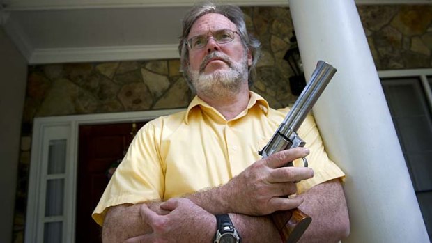 Gun holder ... Kennesaw historian, author and gun advocate Robert Jones.