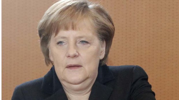 "We haven't overcome the crisis yet" ... German Chancellor Angela Merkel.
