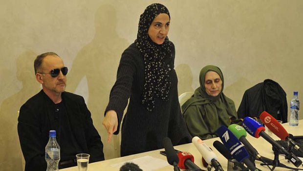 Zubeidat Tsarnaeva: the mother of the suspected Boston bombers, centre, was overwhelmed with grief one moment and defiant the next at a news conference.