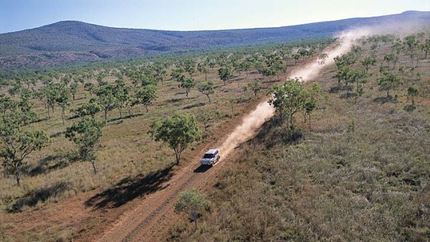 Driving the dusty Gibb River Road.