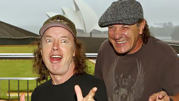 Rock on … Angus Young and Brian Johnson at The Rocks in Sydney yesterday.