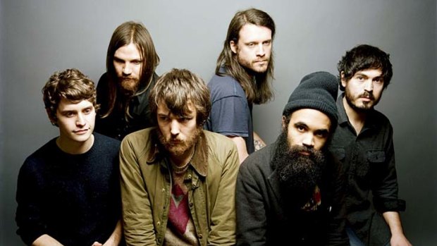 Skye Skjelset (left), Robin Pecknold (front row, second from left) and the rest of Fleet Foxes are hoping to tour  Australia at the end of the year.