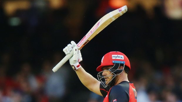 Great knock: Aaron Finch salutes the crowd after reaching 50.