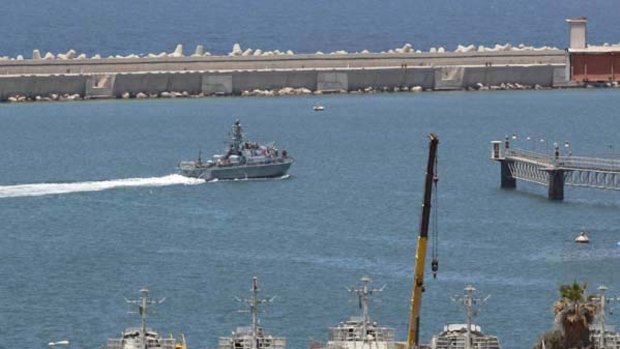 An Israeli navy patrol boat goes through manoeuvres at the port of Ashdod today.