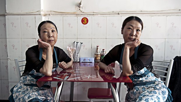 SHOOT THE CHEF 2013
The sisters Jin by Hugh Rutherford

I came across these two delightful twin sisters, Ying and Lan, who run the Chong Quing Twins Restaurant in Mianning County, Sichuan Province. They recommended their homemade rice noodle soup.?