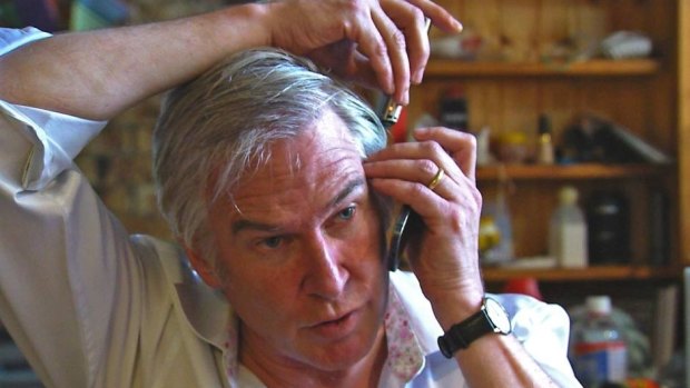 Michael Lawler demonstrating how he secretly recorded telephone conversations.